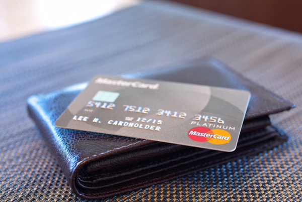 MasterCard Platinum Credit Card close-up on men's wallet