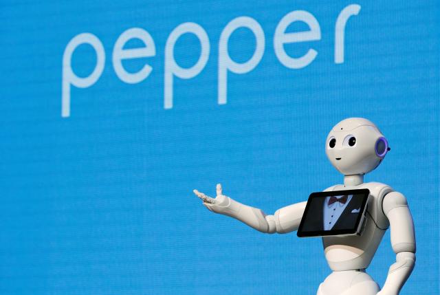 A SoftBank's robot 'pepper', performs during a news conference in Taipei