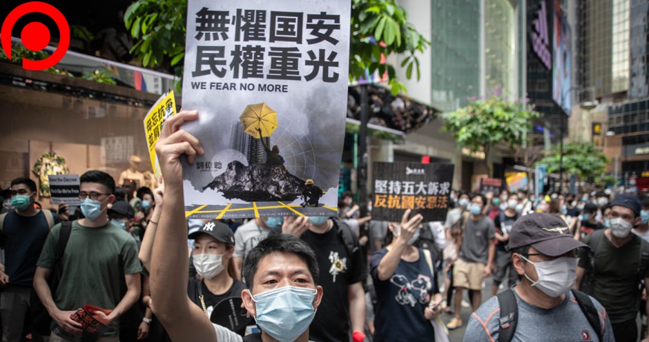 hong kong A protester holds a placard with anti-China message during