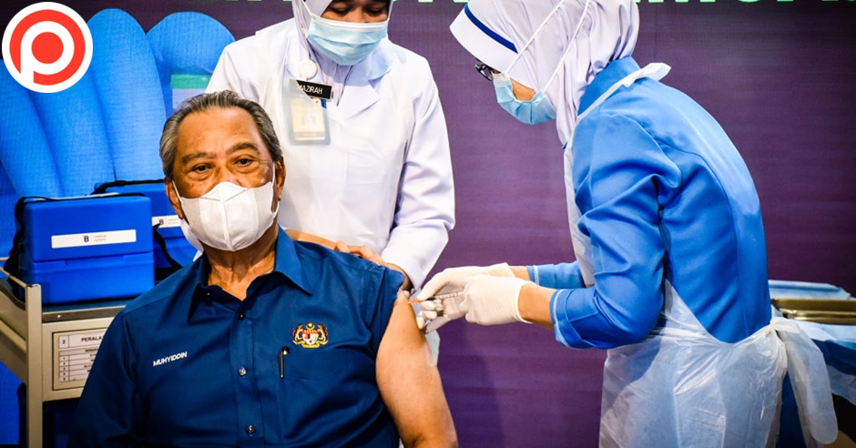 Malaysian PM Muhyiddin receives the first dose of Covid-19 vaccine