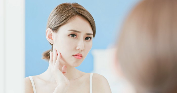 woman with acne problem