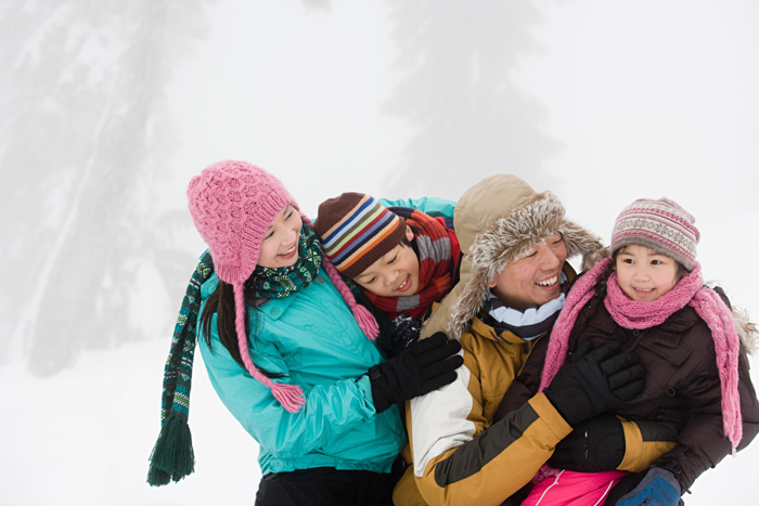 Family having fun in winter