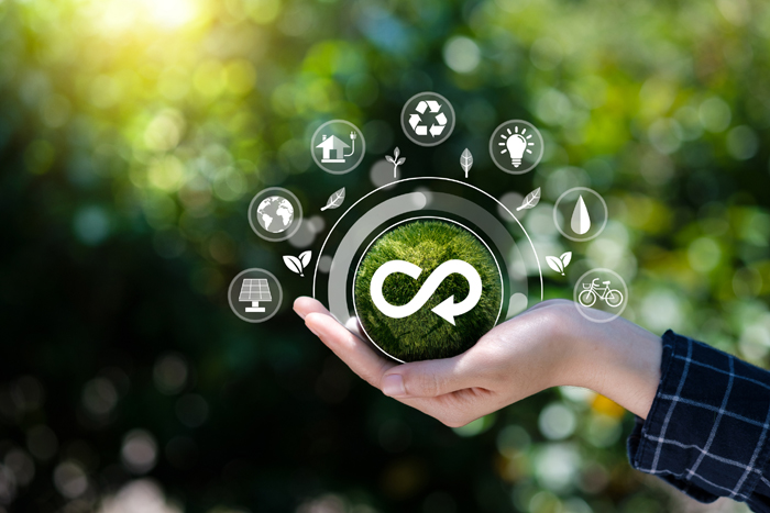 Hand hold the circular economy icon. The concept of eternity, endless and unlimited, circular economy for future growth of business and environment sustainable