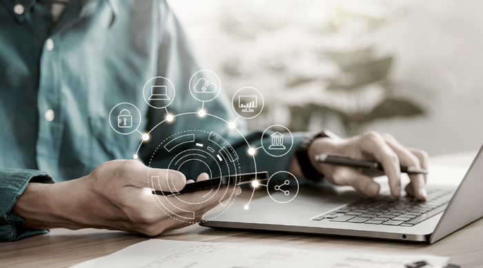 Man working with mobile phone showing cloud computing diagram in hand cloud technology data storage network and internet service concept