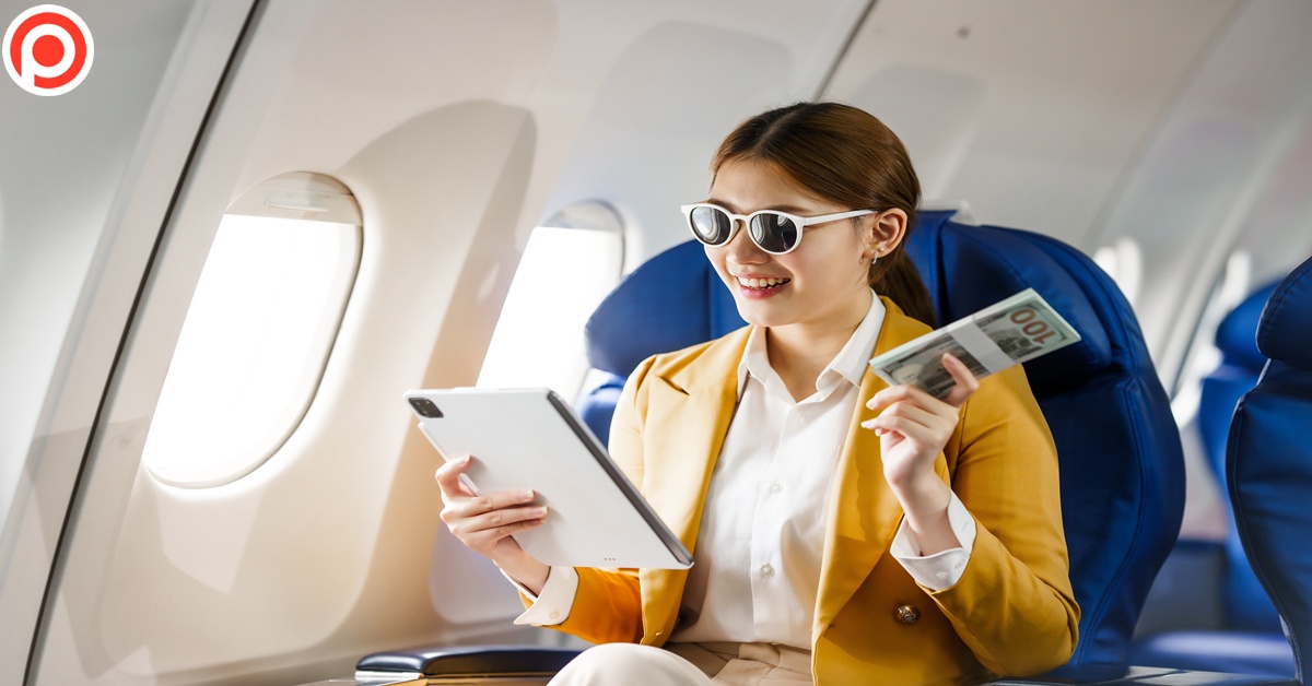 A,Young,Asian,Woman,,Seated,As,An,Airplane,Passenger,,Contemplates